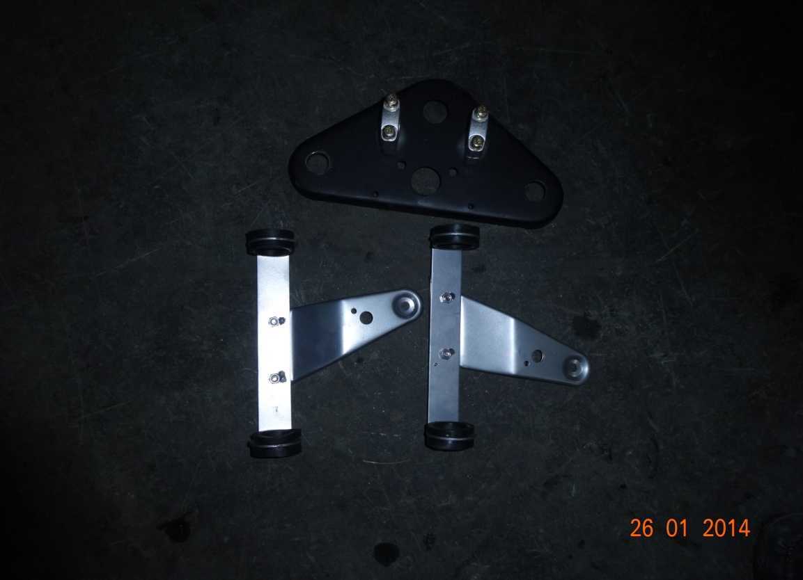 10. Установить скобы передней фары