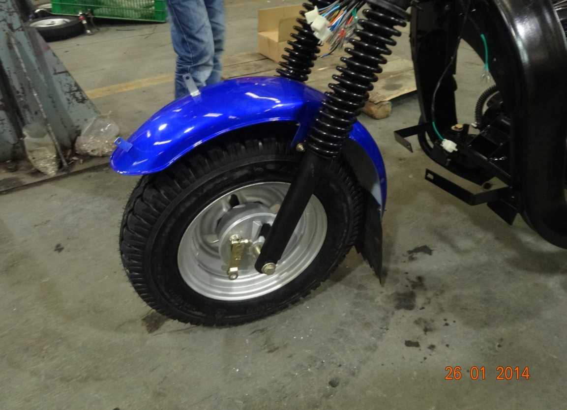 14. Установить колесо на ось